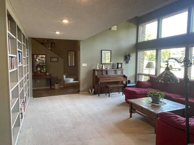 1502 Quail Creek Dr, Conway, AR 72032 - living room with carpet, a textured ceiling, and built in features