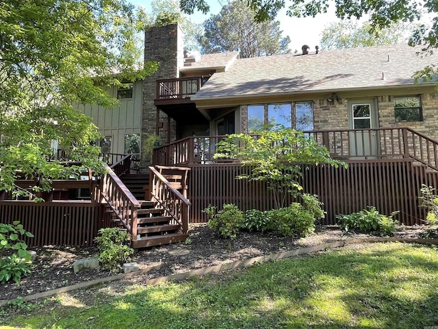 1502 Quail Creek Dr, Conway, AR 72032 - rear view of property with stairway, a chimney, board and batten siding, roof with shingles, and a wooden deck