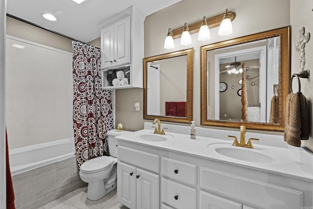 bathroom with toilet, double vanity, and shower / tub combo