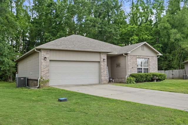 ranch-style home featuring brick siding, an attached garage, cooling unit, driveway, and roof with shingles