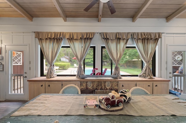 107 W Sunset, Sheridan, AR 72150 - dining room with beamed ceiling, wood finished floors, wood ceiling, plenty of natural light, and ceiling fan