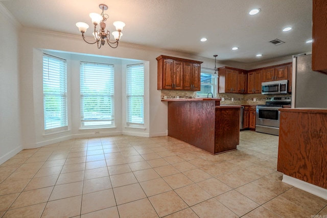 kitchen featuring stainless steel appliances, crown molding, a chandelier, light tile patterned floors, and decorative backsplash