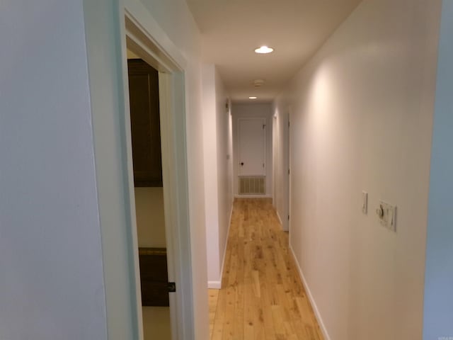 14301 Ridgewood, Little Rock, AR 72211 - hallway with light wood-type flooring, recessed lighting, and baseboards