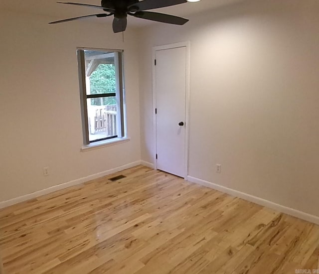 14301 Ridgewood, Little Rock, AR 72211 - unfurnished bedroom with light wood-type flooring, baseboards, and ceiling fan