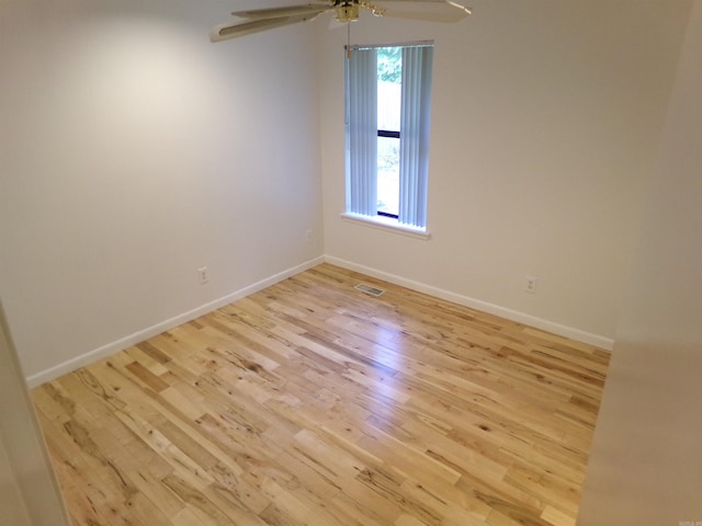 14301 Ridgewood, Little Rock, AR 72211 - empty room featuring light wood-type flooring, baseboards, and a ceiling fan