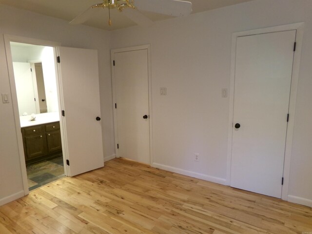 14301 Ridgewood, Little Rock, AR 72211 - unfurnished bedroom with light wood-style floors and ensuite bath