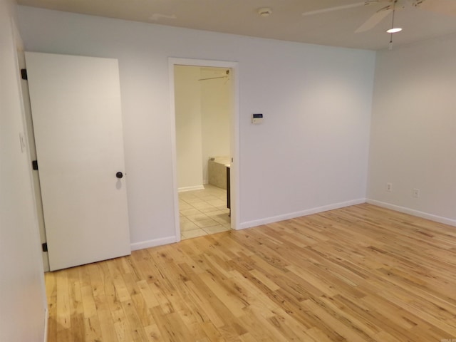 14301 Ridgewood, Little Rock, AR 72211 - empty room featuring light wood-style flooring, ceiling fan, baseboards, and a smoke detector