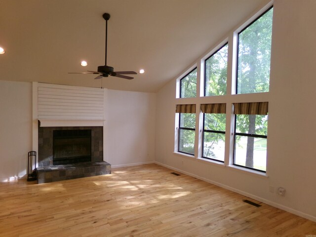14301 Ridgewood, Little Rock, AR 72211 - unfurnished living room featuring ceiling fan, baseboards, recessed lighting, a fireplace, and wood finished floors