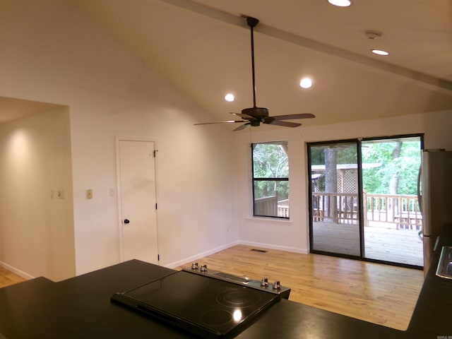 14301 Ridgewood, Little Rock, AR 72211 - kitchen featuring light wood-type flooring, vaulted ceiling, recessed lighting, cooktop, and baseboards