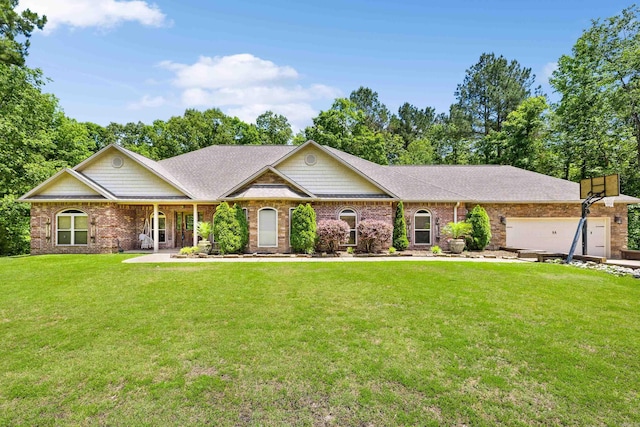 402 Demuth, Benton, AR 72019 - single story home featuring a front yard, an attached garage, roof with shingles, and brick siding