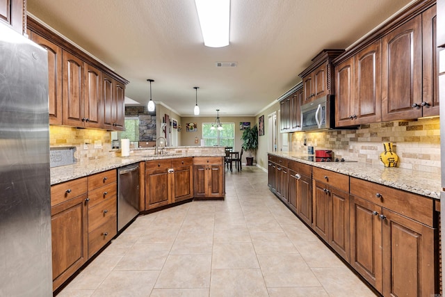 402 Demuth, Benton, AR 72019 - kitchen featuring stainless steel appliances, a peninsula, decorative backsplash, ornamental molding, and light stone countertops