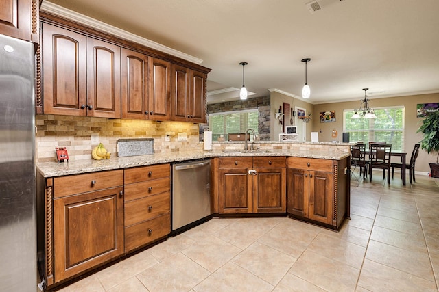 402 Demuth, Benton, AR 72019 - kitchen with stainless steel appliances, a sink, crown molding, a peninsula, and backsplash