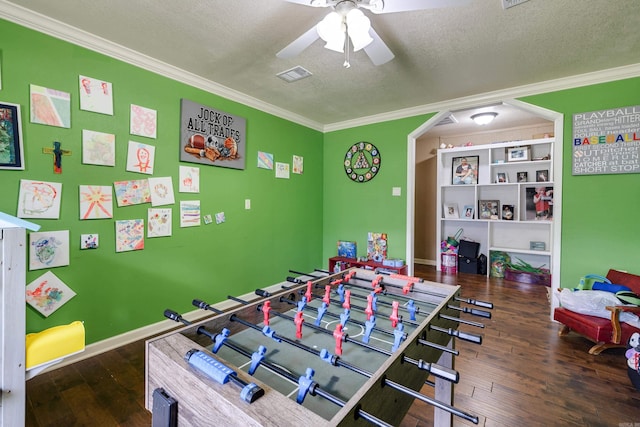 402 Demuth, Benton, AR 72019 - rec room with ornamental molding, ceiling fan, hardwood / wood-style floors, a textured ceiling, and arched walkways