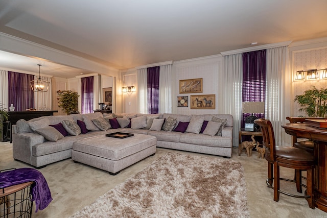 1705 W Cedar St, El Dorado, AR 71730 - living area featuring carpet, a chandelier, and crown molding