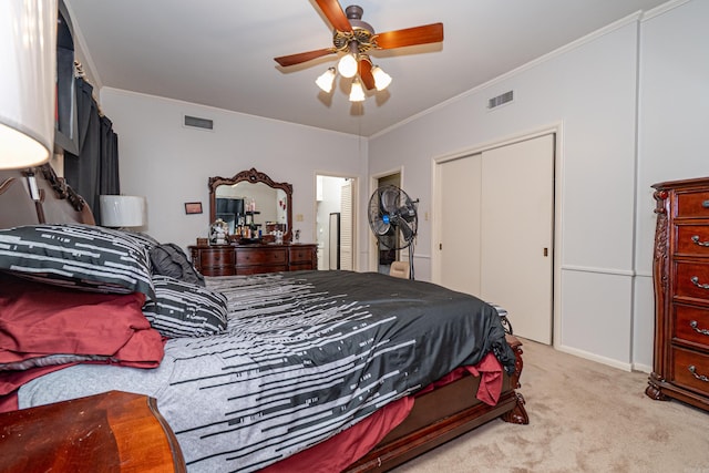 1705 W Cedar St, El Dorado, AR 71730 - bedroom featuring crown molding, carpet, a closet, and ceiling fan