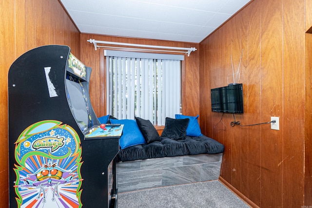 1705 W Cedar St, El Dorado, AR 71730 - bedroom with carpet and wood walls