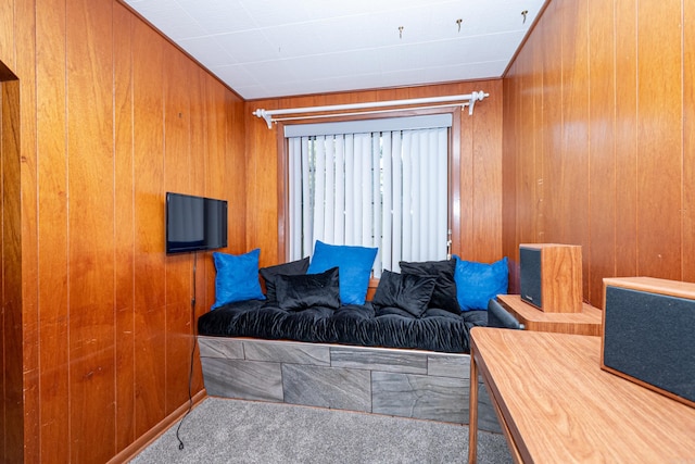 1705 W Cedar St, El Dorado, AR 71730 - living room with carpet and wood walls