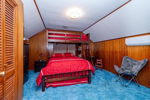 1705 W Cedar St, El Dorado, AR 71730 - bedroom with a wall mounted AC, vaulted ceiling, carpet floors, and wood walls