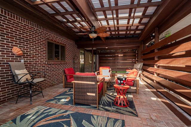 1705 W Cedar St, El Dorado, AR 71730 - view of patio / terrace with a ceiling fan, a pergola, and an outdoor hangout area