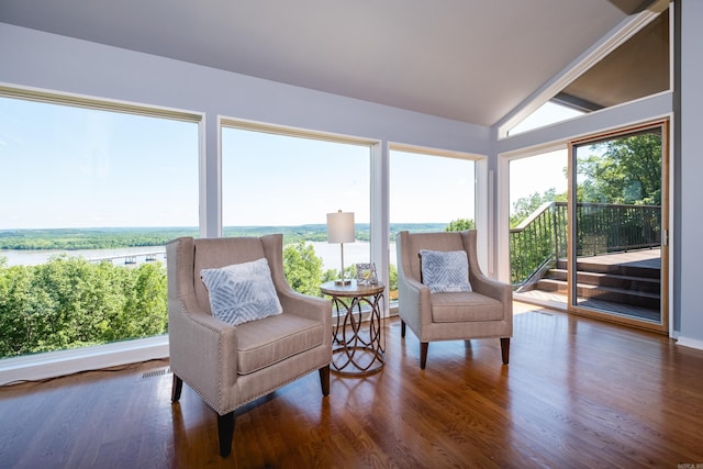 1 Rivers Edge Dr, Little Rock, AR 72227 - sunroom featuring wood finished floors, a water view, vaulted ceiling, and plenty of natural light