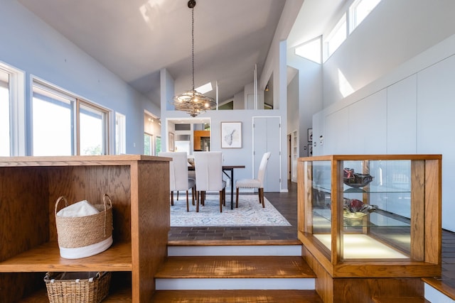 1 Rivers Edge Dr, Little Rock, AR 72227 - dining space featuring a chandelier, high vaulted ceiling, and healthy amount of natural light