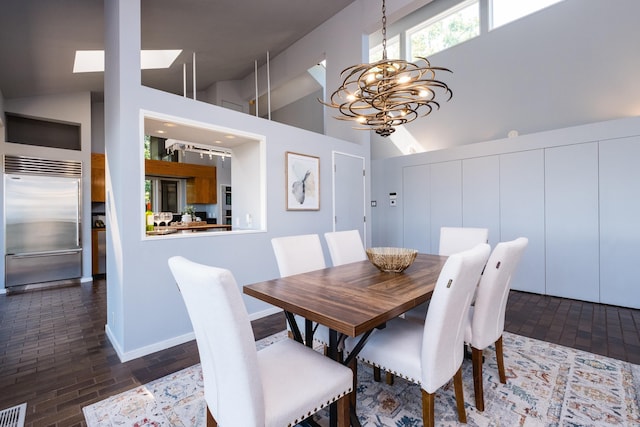 1 Rivers Edge Dr, Little Rock, AR 72227 - dining space with high vaulted ceiling, a chandelier, brick patterned floors, and a skylight