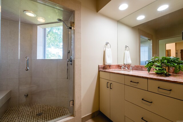 1 Rivers Edge Dr, Little Rock, AR 72227 - bathroom with vanity, a stall shower, and recessed lighting