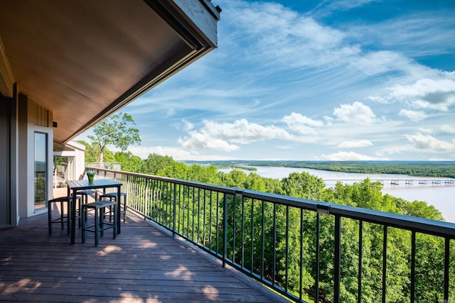 1 Rivers Edge Dr, Little Rock, AR 72227 - wooden deck with a water view and outdoor dining space
