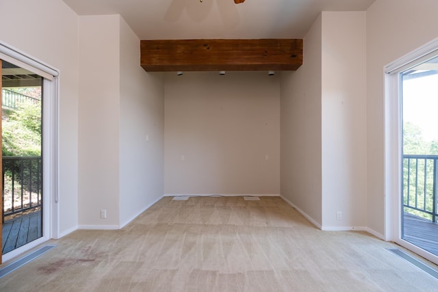 1 Rivers Edge Dr, Little Rock, AR 72227 - spare room with light carpet, beam ceiling, plenty of natural light, and baseboards