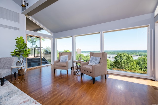 1 Rivers Edge Dr, Little Rock, AR 72227 - sunroom / solarium featuring lofted ceiling, wood finished floors, and a water view