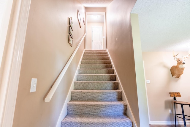 204 Riverside Dr, Pangburn, AR 72121 - stairway with a textured ceiling