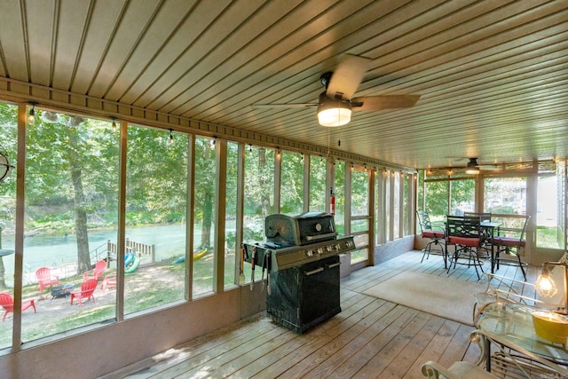 204 Riverside Dr, Pangburn, AR 72121 - sunroom with a ceiling fan, plenty of natural light, and outdoor dining space