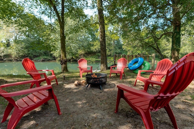 204 Riverside Dr, Pangburn, AR 72121 - view of community featuring an outdoor fire pit and a water view