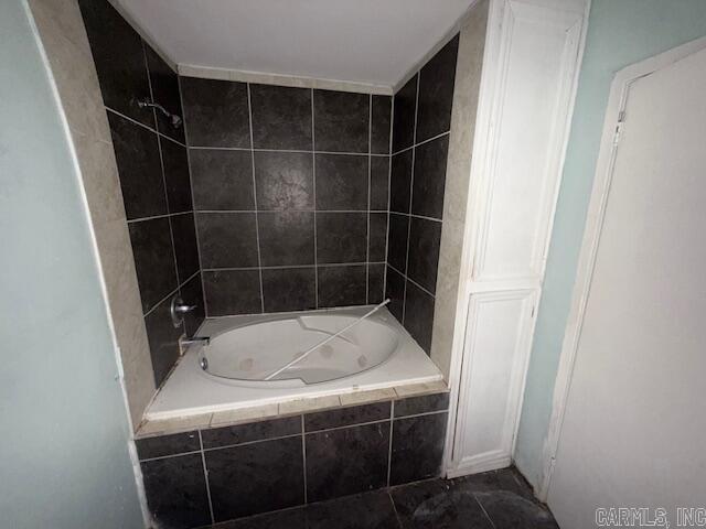 bathroom featuring tile patterned flooring