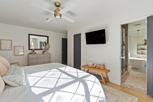 bedroom featuring light wood-style floors and ceiling fan