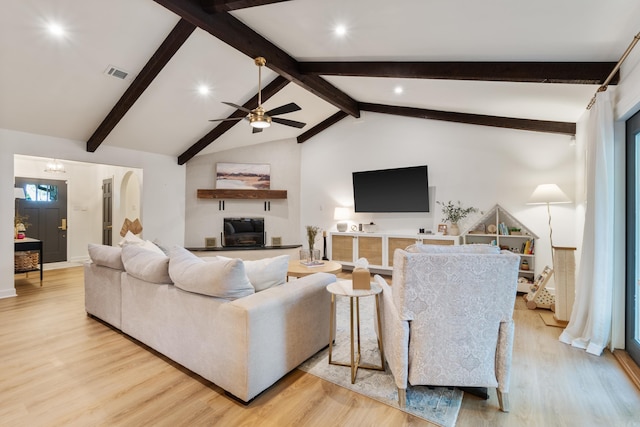 living room featuring wood finished floors, ceiling fan, and recessed lighting