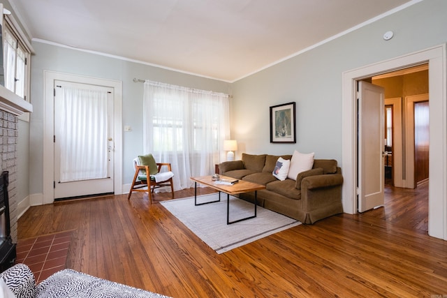 5200 I St, Little Rock, AR 72205 - living area with a fireplace, hardwood / wood-style floors, ornamental molding, and baseboards