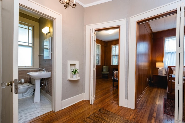 5200 I St, Little Rock, AR 72205 - hallway featuring dark wood-style flooring and baseboards