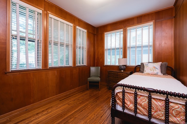 5200 I St, Little Rock, AR 72205 - bedroom with wood finished floors, wooden walls, and baseboards