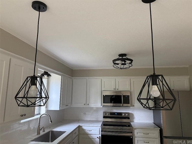 3705 E 6th St, Russellville, AR 72802 - kitchen featuring appliances with stainless steel finishes, a sink, tasteful backsplash, white cabinetry, and ornamental molding