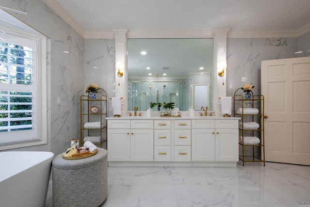 bathroom featuring decorative columns, marble finish floors, double vanity, a marble finish shower, and a freestanding tub