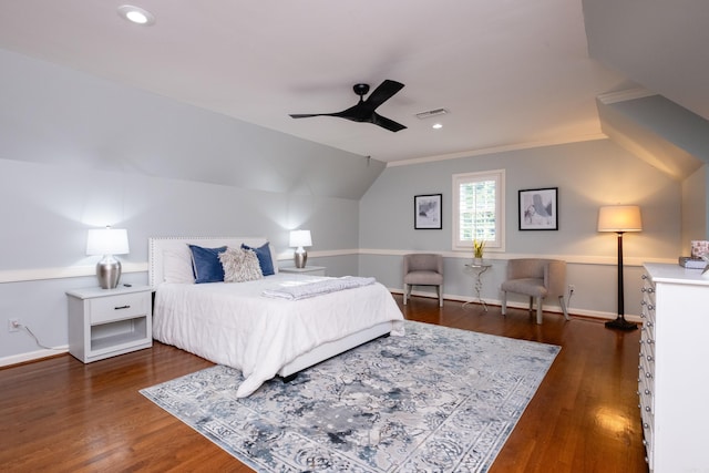 bedroom with ornamental molding, dark wood-type flooring, baseboards, lofted ceiling, and ceiling fan