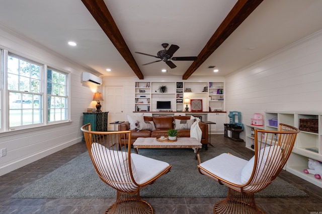 living room with a wall unit AC, a ceiling fan, beam ceiling, and a fireplace