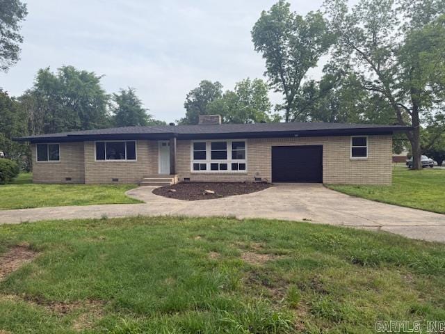 307 E 5th St, Carlisle, AR 72024 - single story home with driveway, a garage, crawl space, and a front lawn