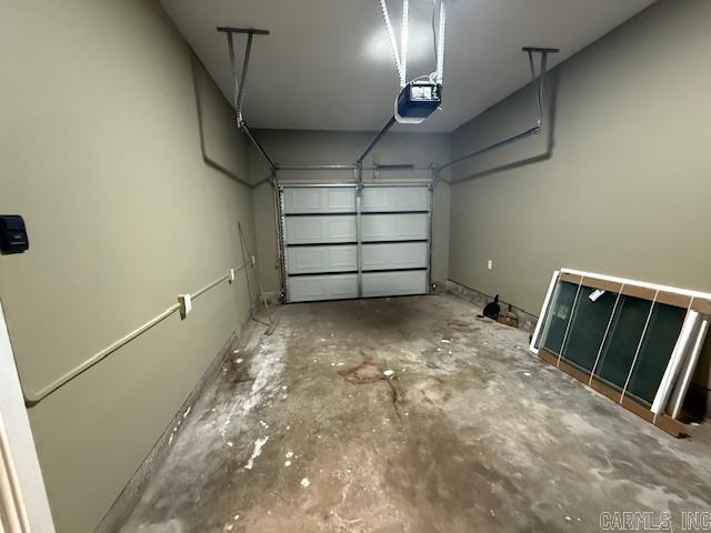 307 E 5th St, Carlisle, AR 72024 - garage with a garage door opener