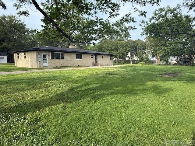 307 E 5th St, Carlisle, AR 72024 - view of green lawn