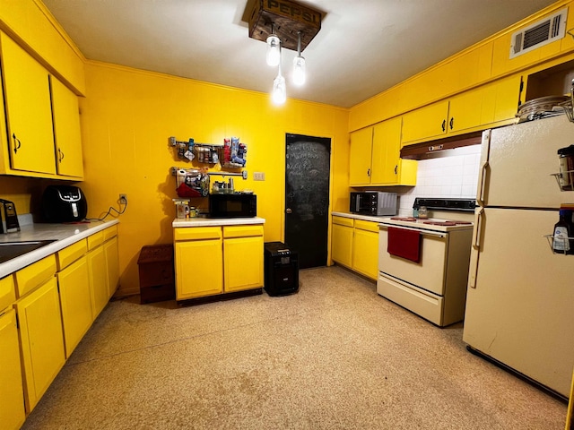 96 E Lakeshore Dr, Cherokee Village, AR 72529 - kitchen featuring white appliances, under cabinet range hood, yellow cabinetry, and crown molding
