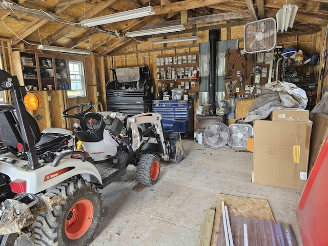 garage with a workshop area
