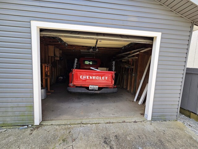 garage featuring driveway