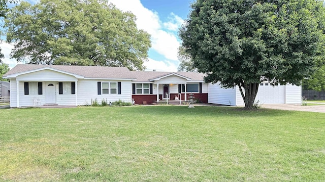 ranch-style home with covered porch, driveway, a garage, and a front yard